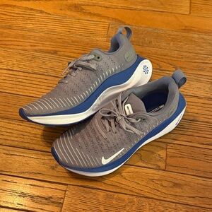 Gray and Blue Nike reactx infinity run 4